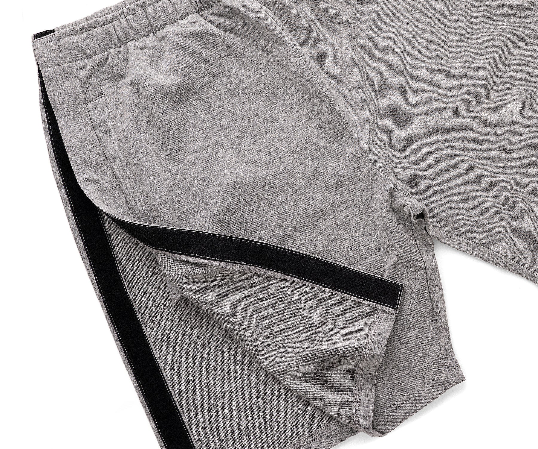 Gray shorts with a black velcro straps on a white background Gray shorts with a black velcro straps on a white background