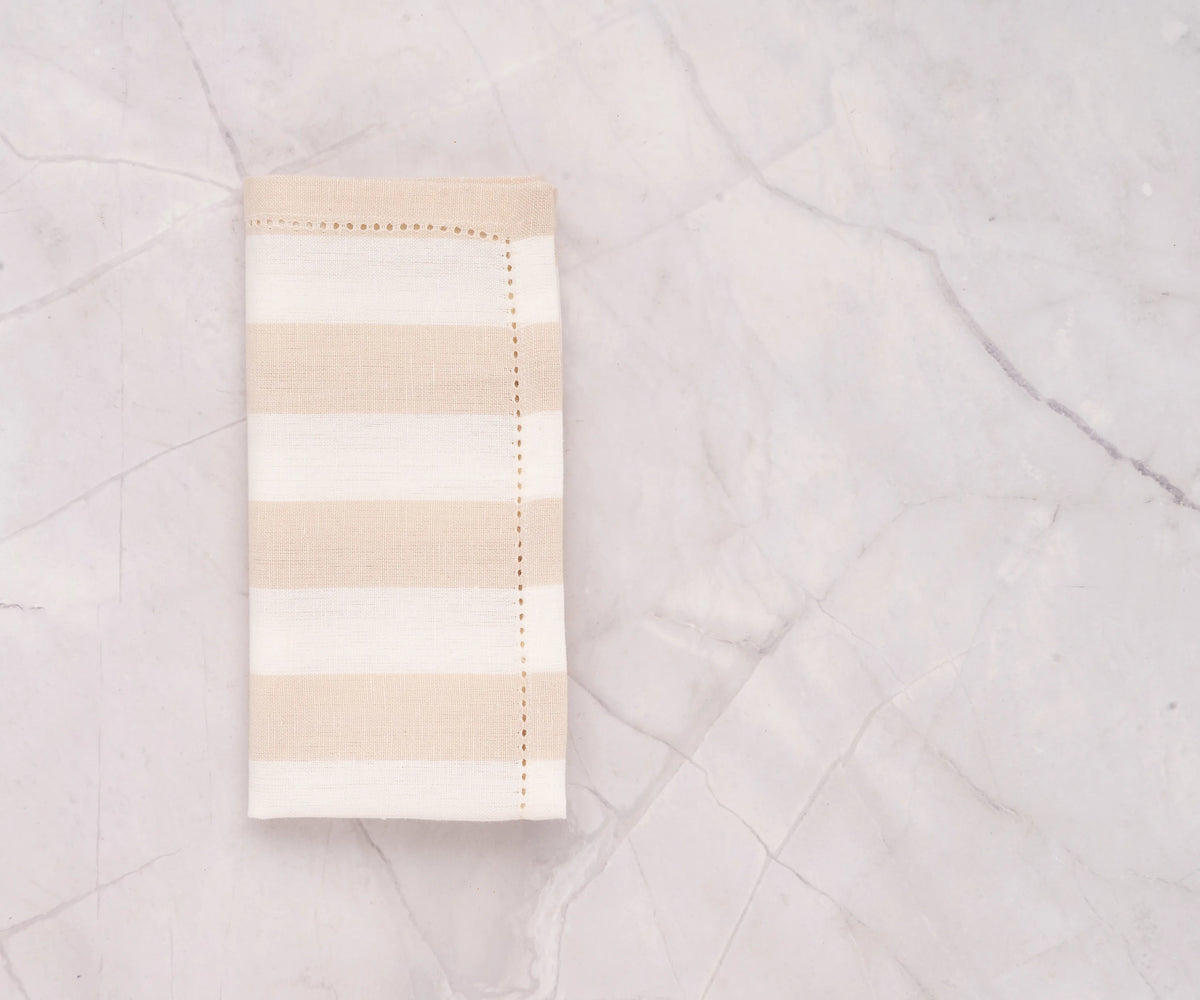 Luxury cotton beige napkins with cabana stripe, perfect for entertaining guests.
 Luxury cotton beige napkins with cabana stripe, perfect for entertaining guests.