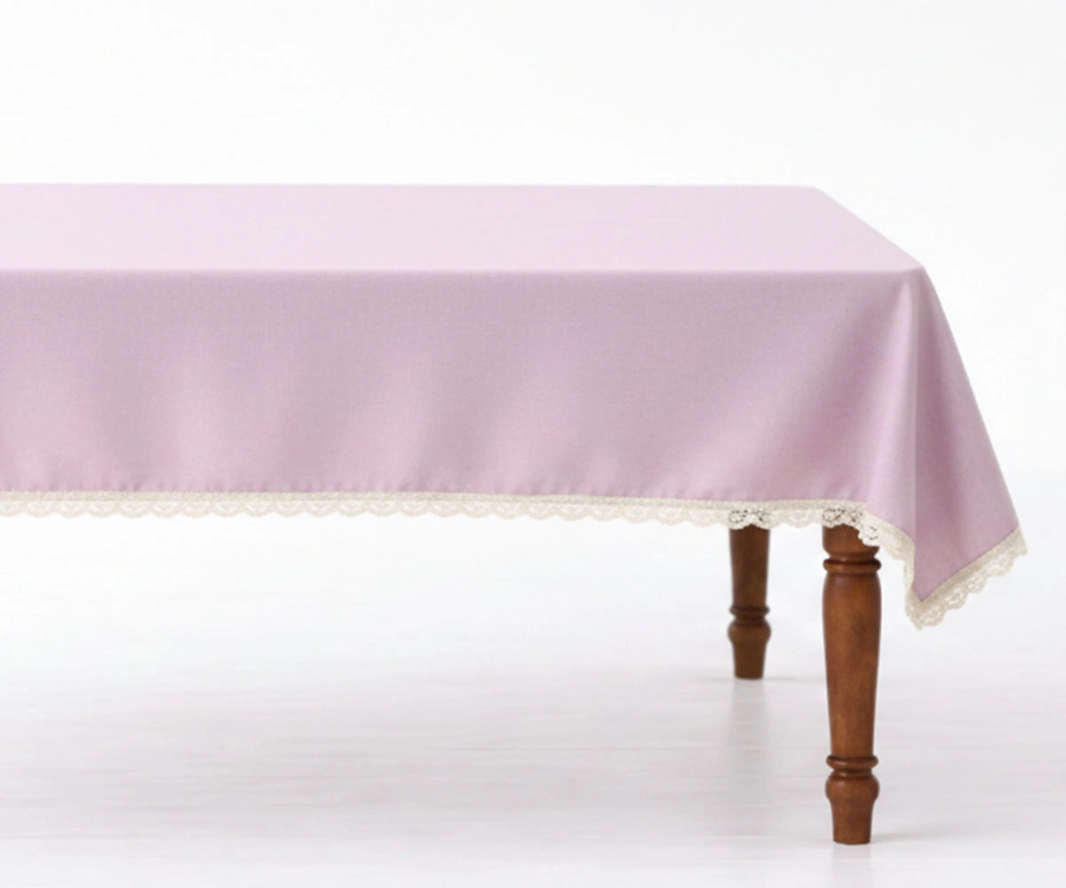 Blush Lavender cotton tablecloth with lace edge on dining table Blush Lavender cotton tablecloth with lace edge on dining table