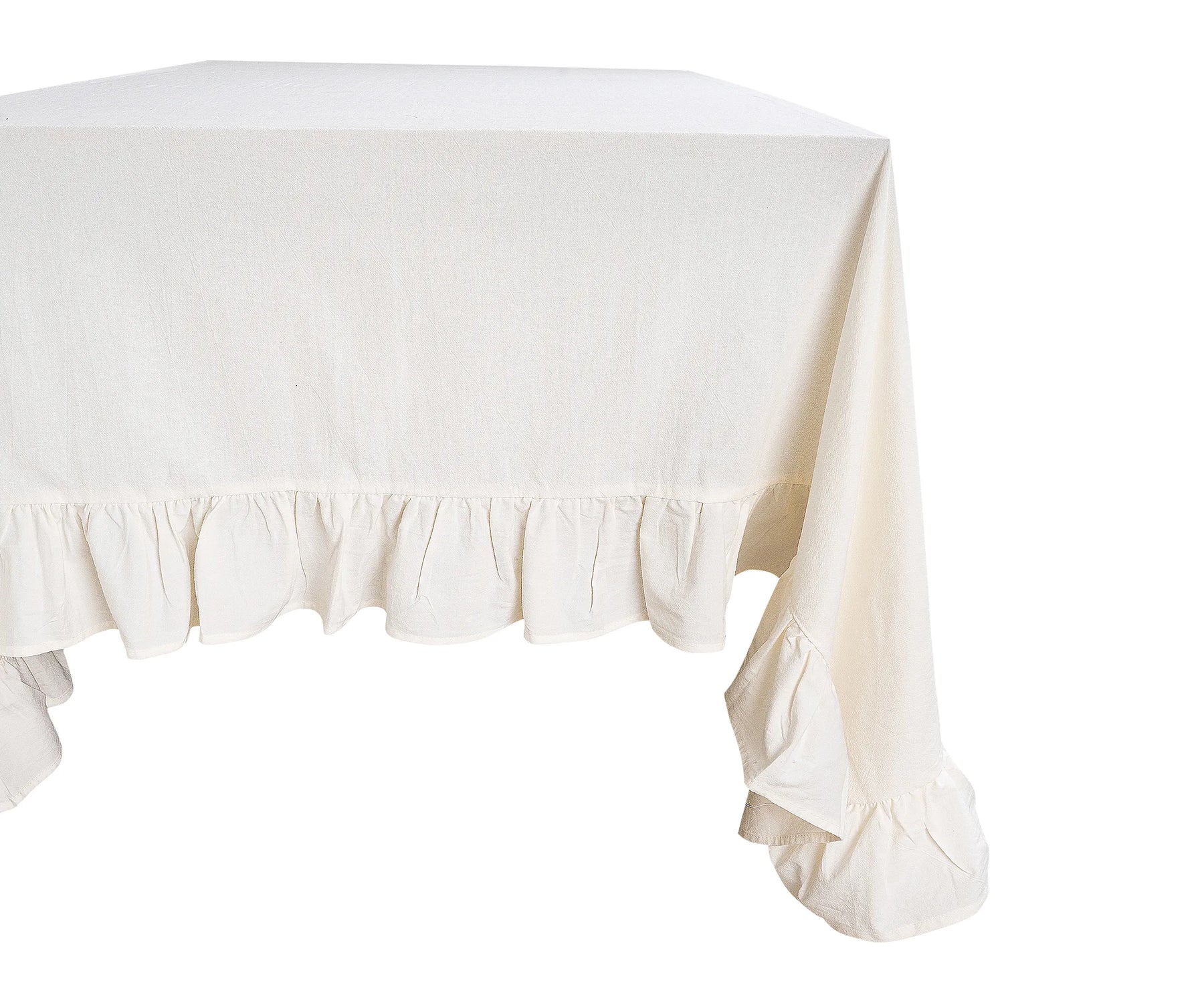 Close-up of soft cotton fabric and ruffle detailing on tablecloth Close-up of soft cotton fabric and ruffle detailing on tablecloth
