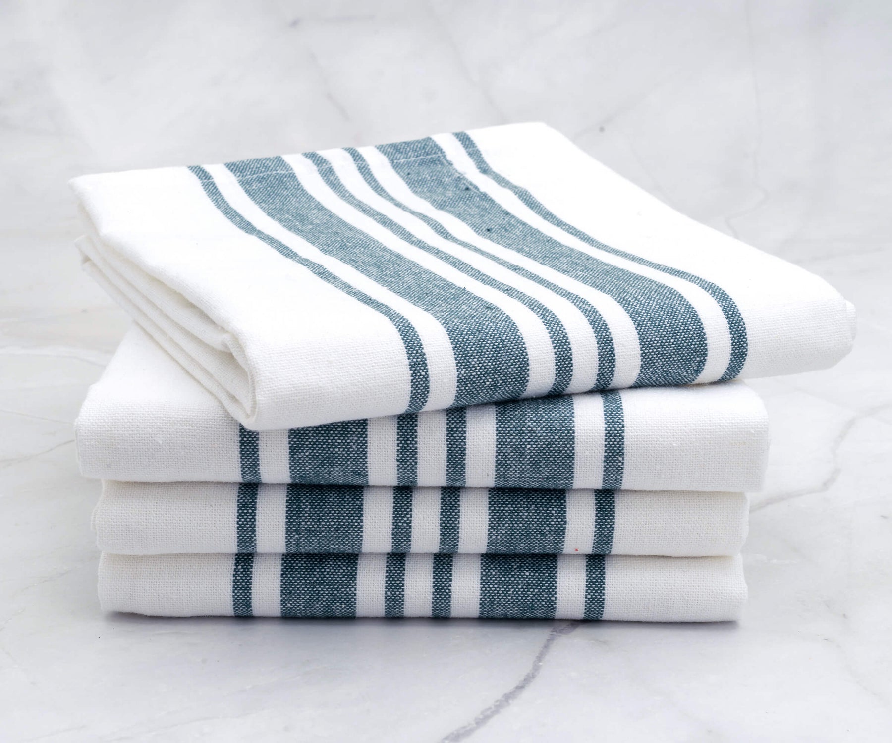 A set of stylish green kitchen towels made from cotton. A set of stylish green kitchen towels made from cotton.