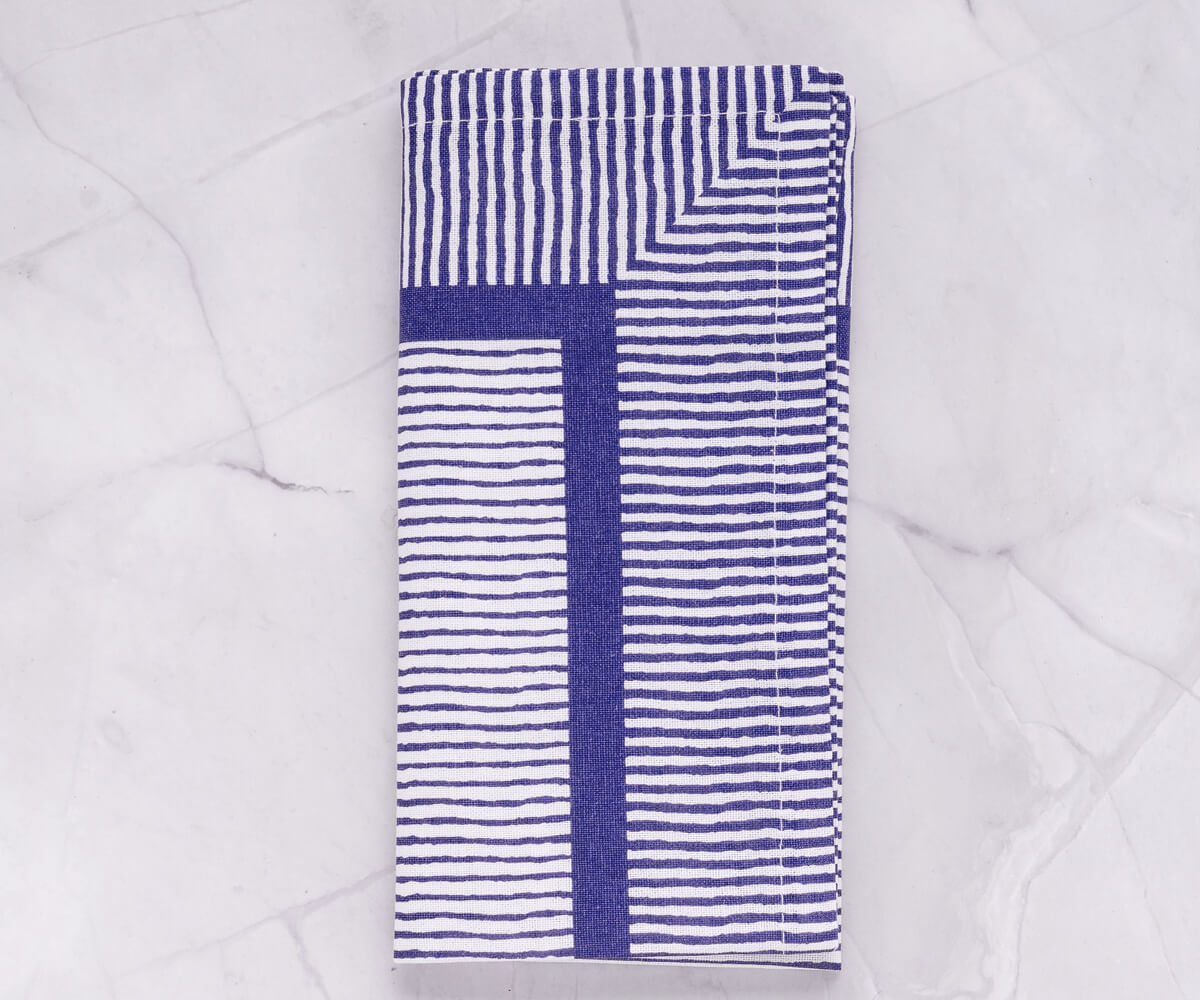 Use blue striped napkins to create a coastal vibe at your next event Use blue striped napkins to create a coastal vibe at your next event