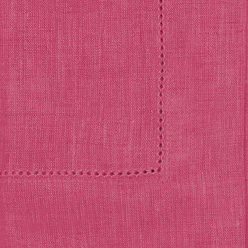 Stack of pink hemstitched linen dinner napkins in various sizes, showcasing soft blush color and elegant stitching. Stack of pink hemstitched linen dinner napkins in various sizes, showcasing soft blush color and elegant stitching.