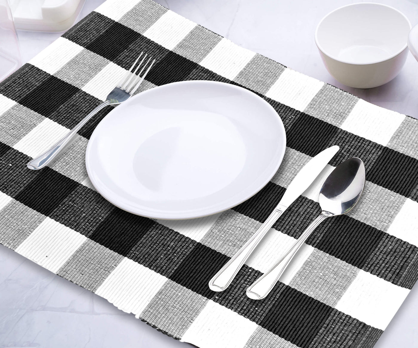 Set your dining table with black buffalo checked placemats. Set your dining table with black buffalo checked placemats.