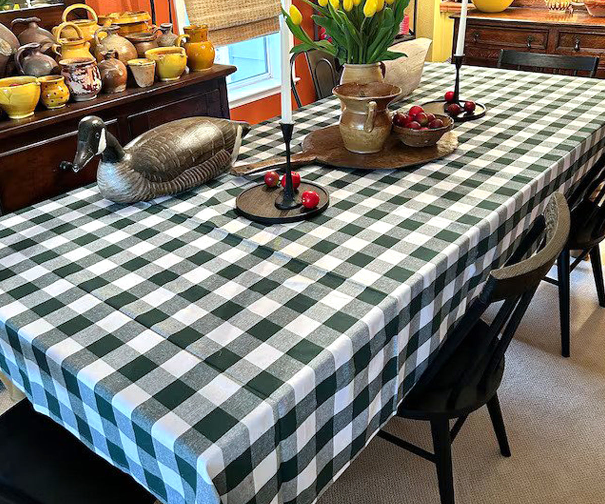 A buffalo plaid, Christmas plaid, blue plaid, and round plaid tablecloth beautifully adorn the table. A buffalo plaid, Christmas plaid, blue plaid, and round plaid tablecloth beautifully adorn the table.