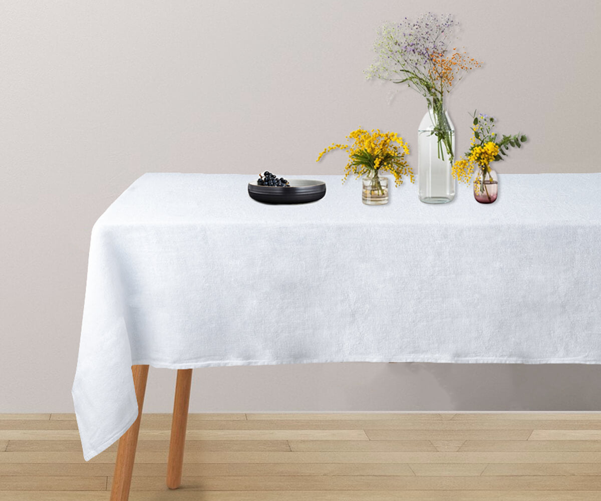 A pure white linen tablecloth for a touch of sophistication. A pure white linen tablecloth for a touch of sophistication.