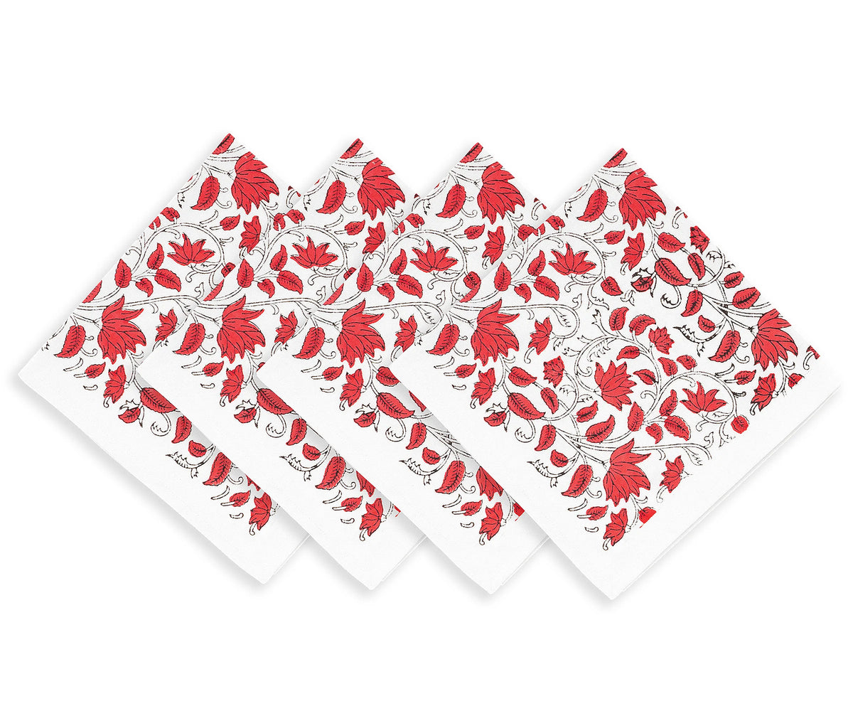 Reusable fabric napkins with elegant floral design beside neutral tableware	 Reusable fabric napkins with elegant floral design beside neutral tableware