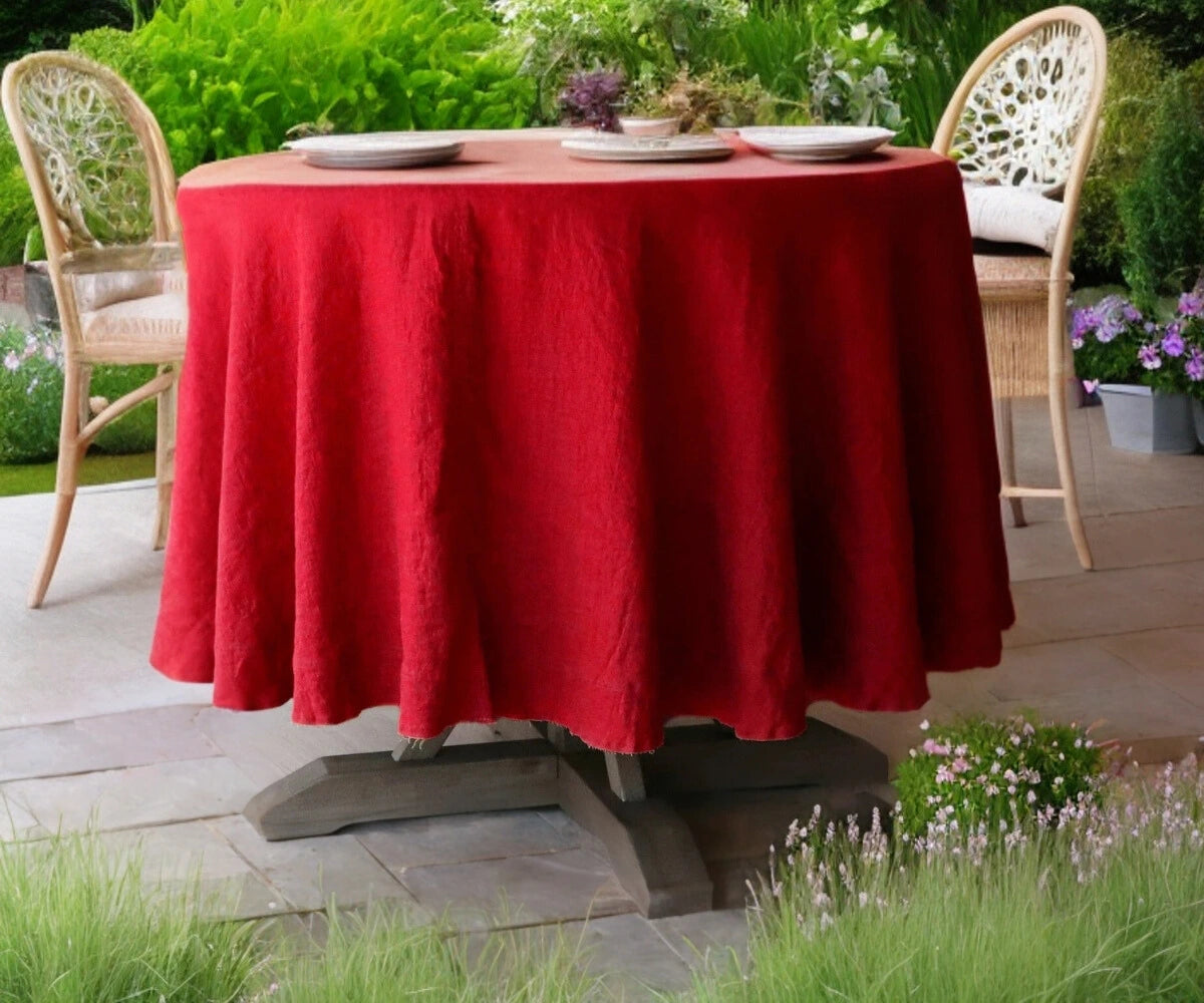 Red round linen tablecloth - cozy christmas dining room setup Red round linen tablecloth - cozy christmas dining room setup