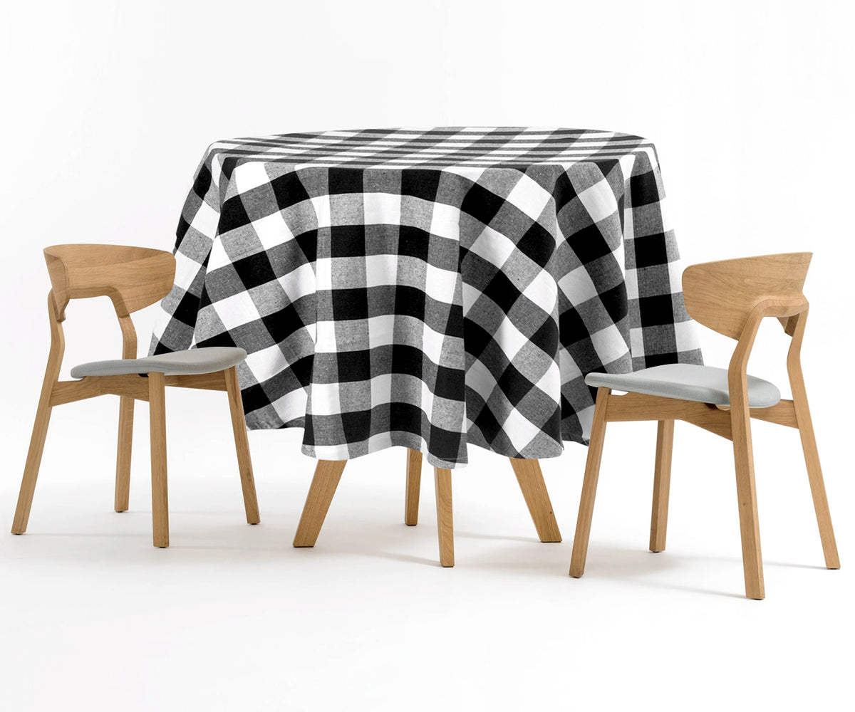 Black round tablecloth, pristine and elegant, complements any tableware and decor effortlessly. Black round tablecloth, pristine and elegant, complements any tableware and decor effortlessly.