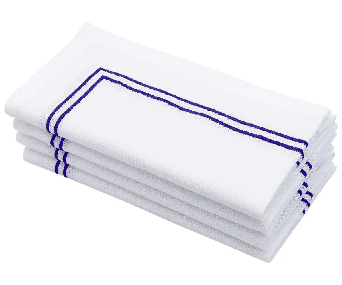 Royal blue napkin with double line embroidery detail. Royal blue napkin with double line embroidery detail.