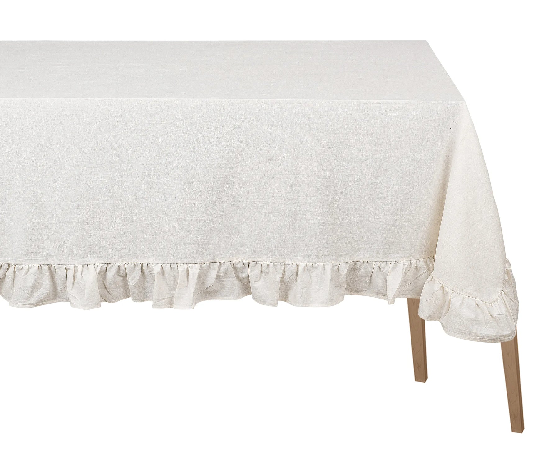 Natural cotton ruffle trim tablecloth on farmhouse dining table Natural cotton ruffle trim tablecloth on farmhouse dining table