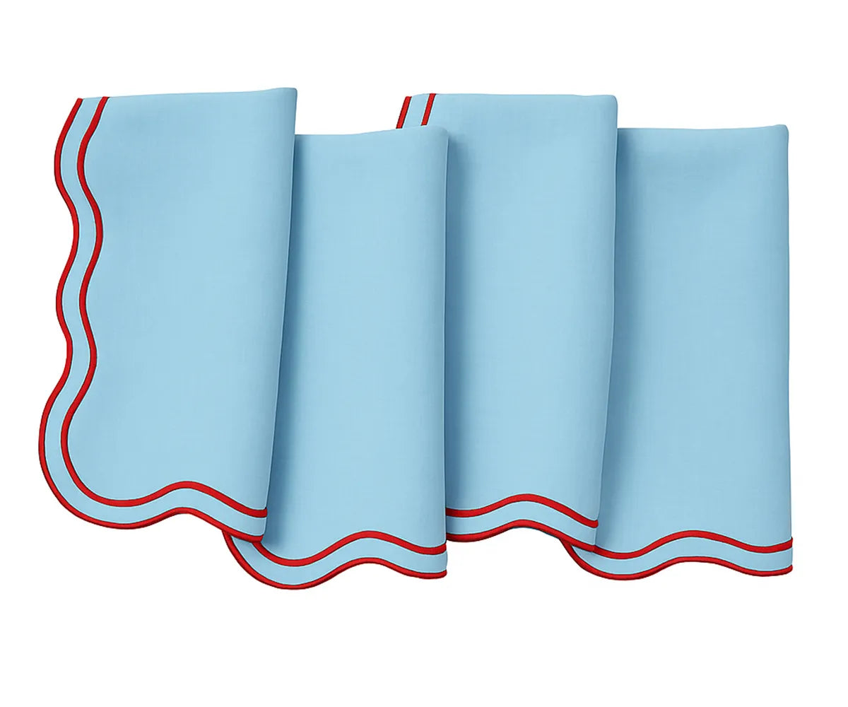 Elegant scalloped edge cotton napkins in light blue and green for casual and formal dining Elegant scalloped edge cotton napkins in light blue and green for casual and formal dining