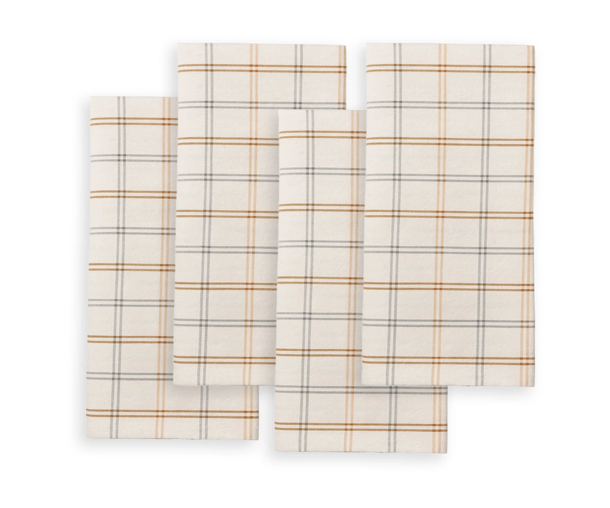 White plaid cotton napkins with gold and gray checks for elegant Christmas table setting White plaid cotton napkins with gold and gray checks for elegant Christmas table setting