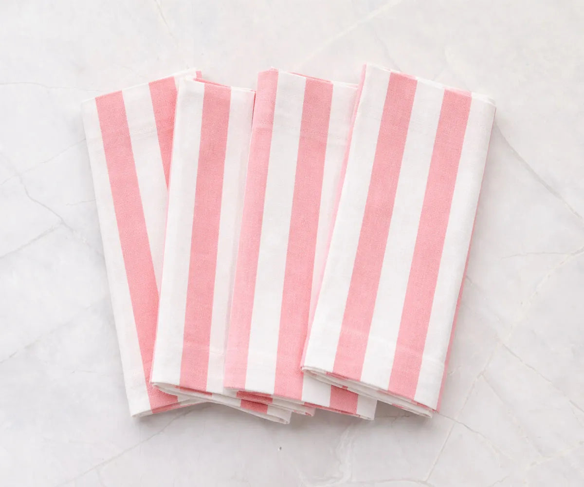 Cabana stripe cloth napkins neatly styled on a dining table with a clean and polished look Cabana stripe cloth napkins neatly styled on a dining table with a clean and polished look