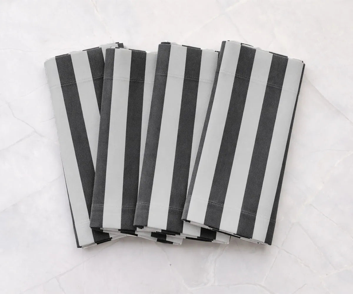 Charcoal and white cabana stripe napkins made from a durable cotton linen fabric, ideal for modern dining table styling and formal table settings. These reusable striped cloth napkins offer a bold yet timeless look for weddings, dinner parties, and farmhouse decor. Easy-care table linens designed for everyday and event use. Charcoal and white cabana stripe napkins made from a durable cotton linen fabric, ideal for modern dining table styling and formal table settings. These reusable striped cloth napkins offer a bold yet timeless look for weddings, dinner parties, and farmhouse decor. Easy-care table linens designed for everyday and event use.