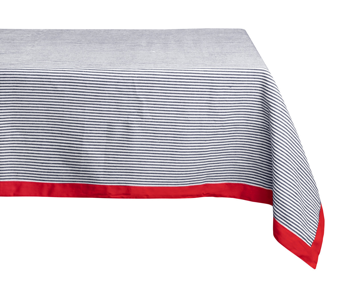Navy tablecloth with a classic pattern and red color accents, perfect for a traditional dining setting. Navy tablecloth with a classic pattern and red color accents, perfect for a traditional dining setting.