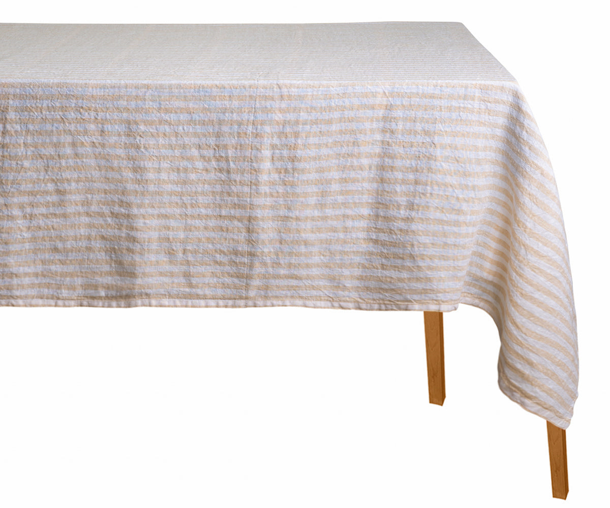 Striped tablecloth on a wooden table with a white background beige tablecloth beige striped tablecloth Striped tablecloth on a wooden table with a white background beige tablecloth beige striped tablecloth