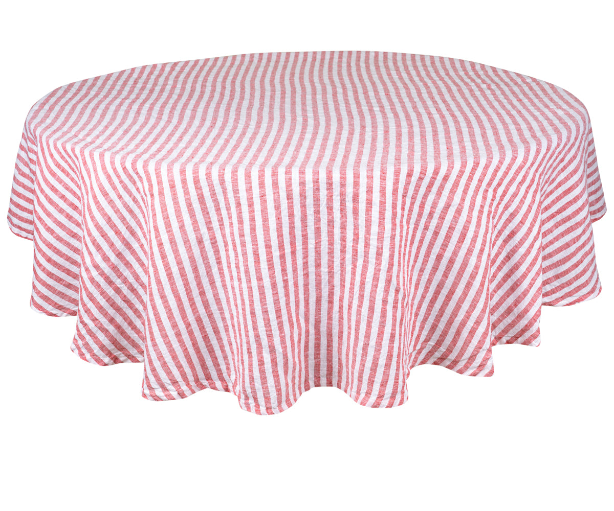 A round red linen tablecloth for a timeless appeal. A round red linen tablecloth for a timeless appeal.