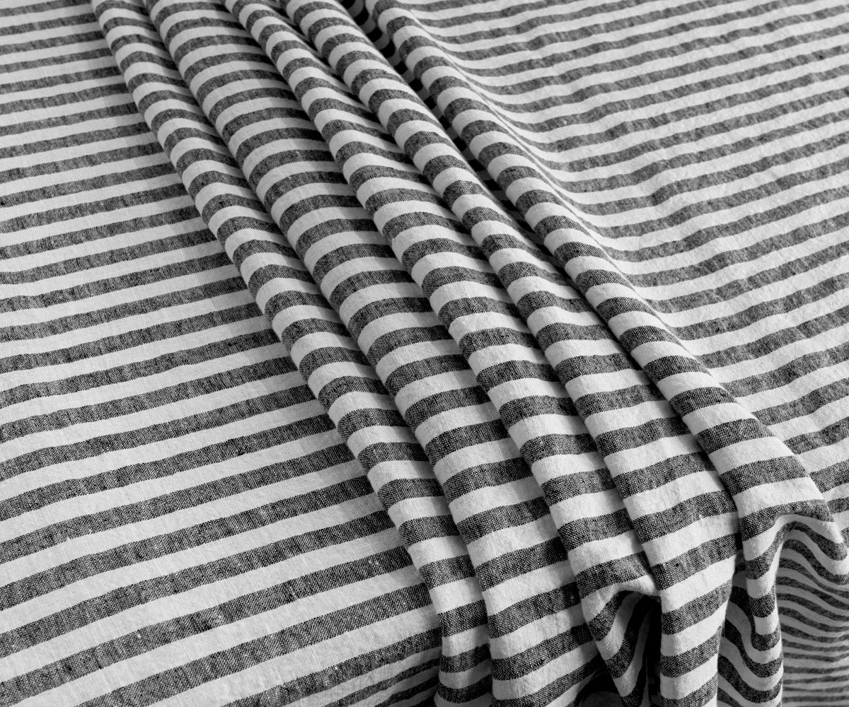 A 60-inch round tablecloth in a versatile design. A 60-inch round tablecloth in a versatile design.