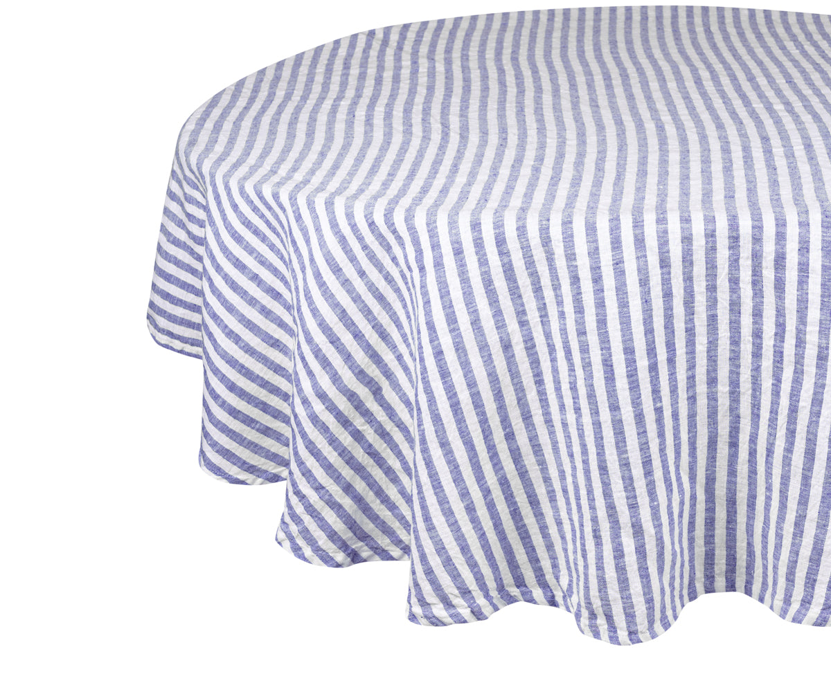 A round white linen tablecloth for a timeless appeal. A round white linen tablecloth for a timeless appeal.