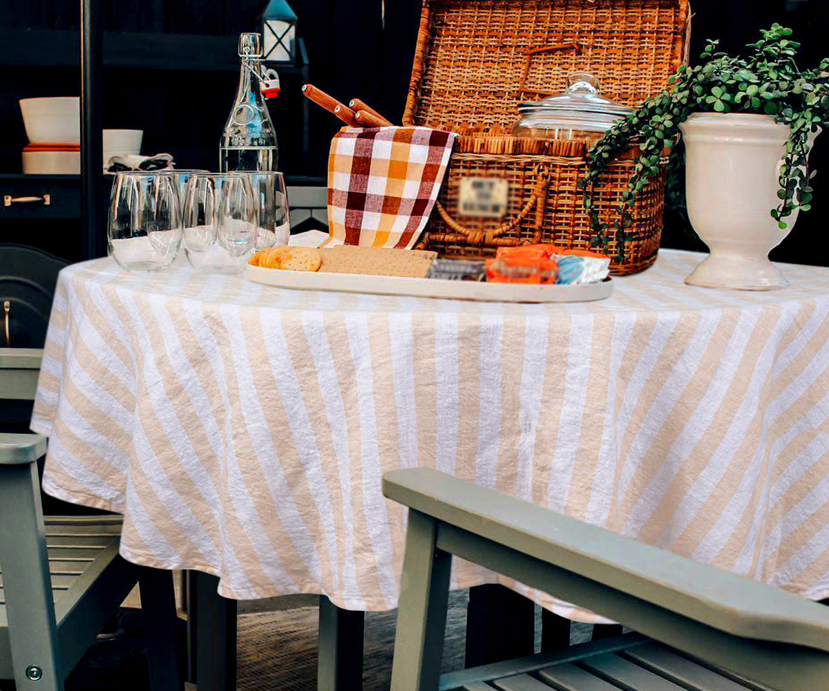 Round linen tablecloths offer an elegant and sophisticated presentation for round dining tables Round linen tablecloths offer an elegant and sophisticated presentation for round dining tables