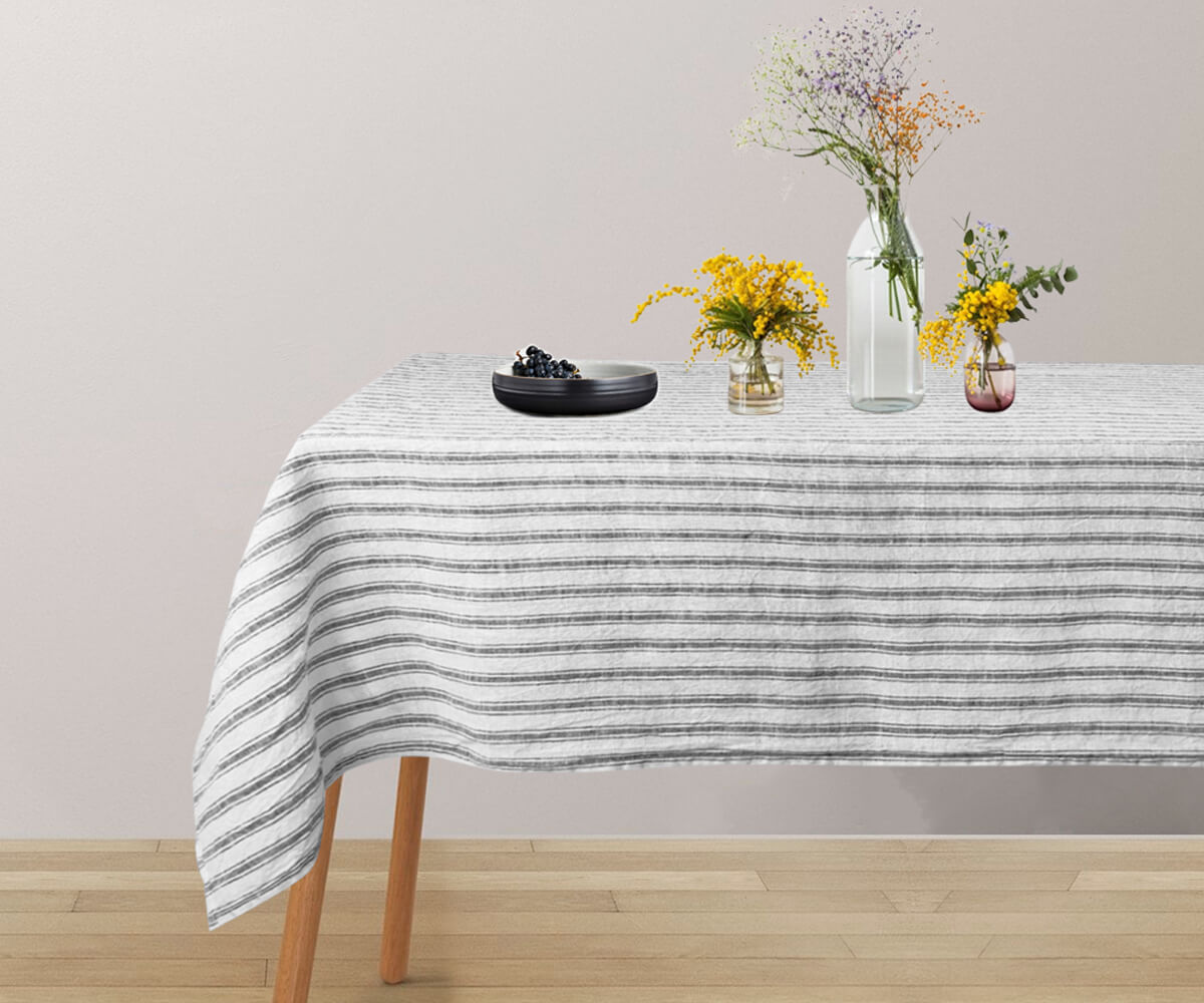 A rectangular linen tablecloth dining room in classic pure linen material. A rectangular linen tablecloth dining room in classic pure linen material.