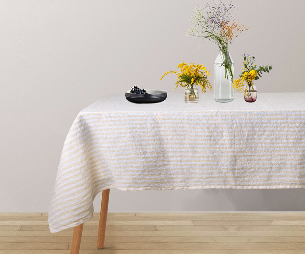 Amalfi-inspired stripe tablecloth, evoking coastal elegance and Italian charm, ideal for stylish and memorable gatherings.