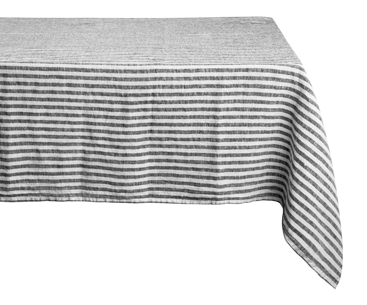 A rustic black farmhouse tablecloth for a cozy feel. A rustic black farmhouse tablecloth for a cozy feel.