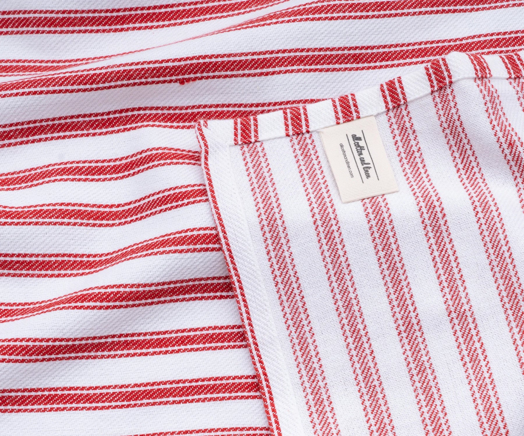 Capri-inspired red ticking stripe napkins for festive or everyday use Capri-inspired red ticking stripe napkins for festive or everyday use