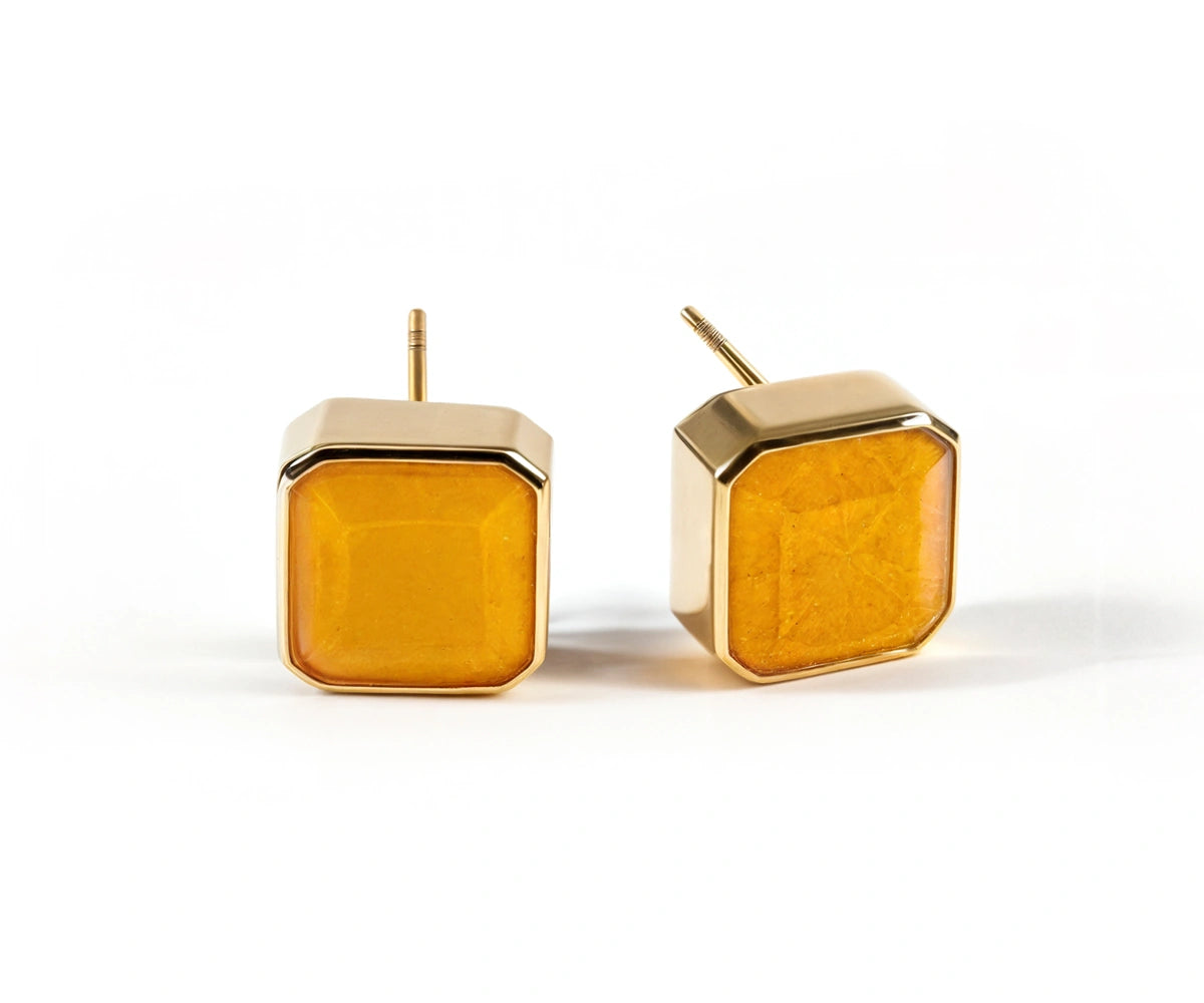 Side view of yellow quartz earrings with a secure push-back closure. Side view of yellow quartz earrings with a secure push-back closure.