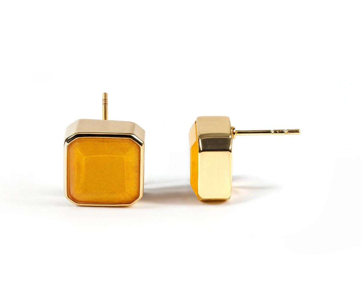 Elegant yellow quartz stud earrings with 18K gold plating, perfect for gifting. Elegant yellow quartz stud earrings with 18K gold plating, perfect for gifting.