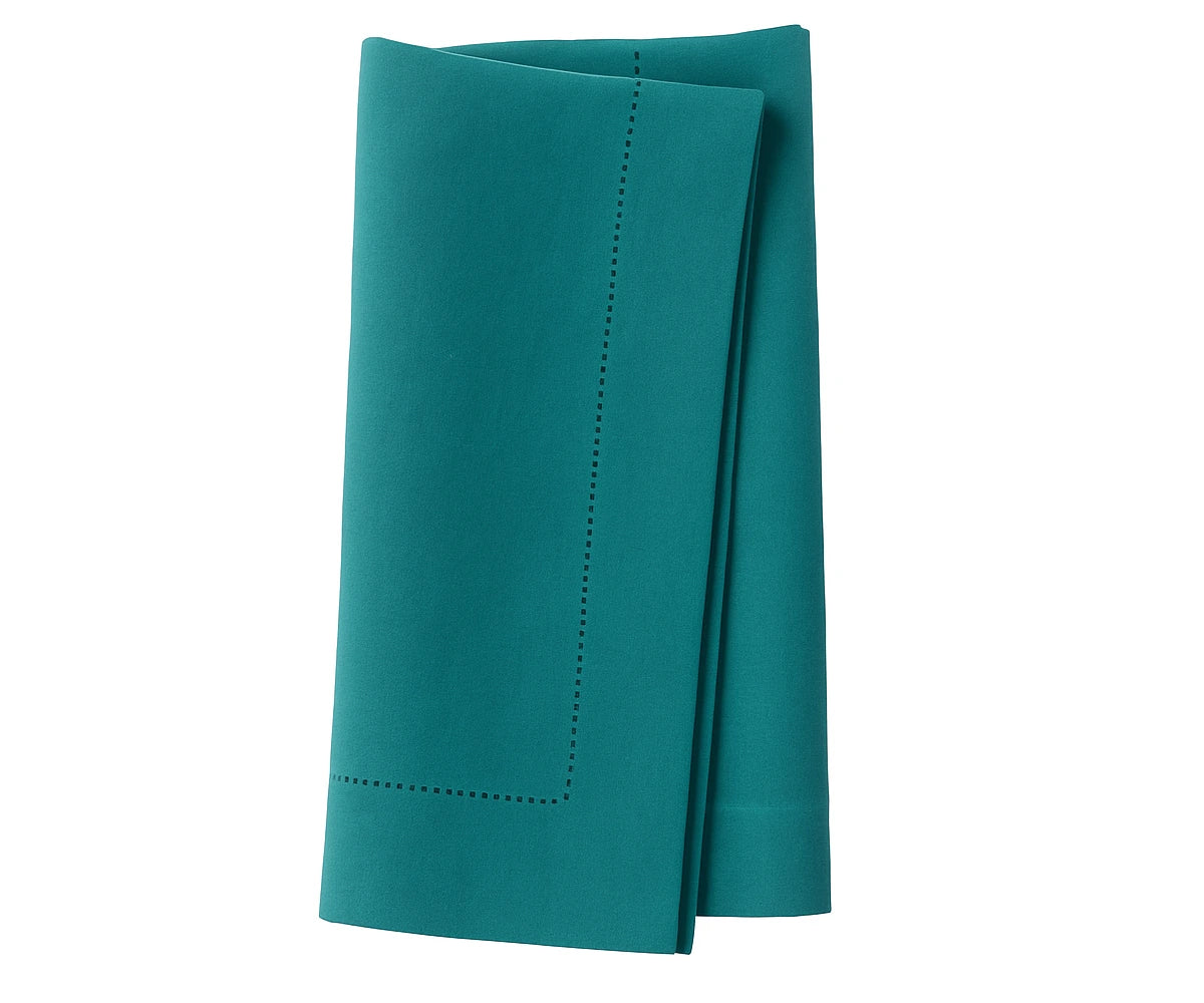 Elegant teal blue cotton napkin made from 100% cotton, adding depth and charm to dining décor Elegant teal blue cotton napkin made from 100% cotton, adding depth and charm to dining décor