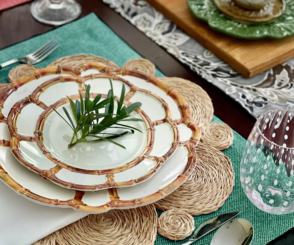 Upgrade your dining table with green fabric placemats, adding charm and protection for a delightful and stylish mealtime experience Upgrade your dining table with green fabric placemats, adding charm and protection for a delightful and stylish mealtime experience