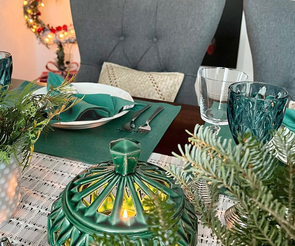 Upgrade your dining table with green fabric placemats, combining charm and protection for a delightful and stylish eating experience  Upgrade your dining table with green fabric placemats, combining charm and protection for a delightful and stylish eating experience