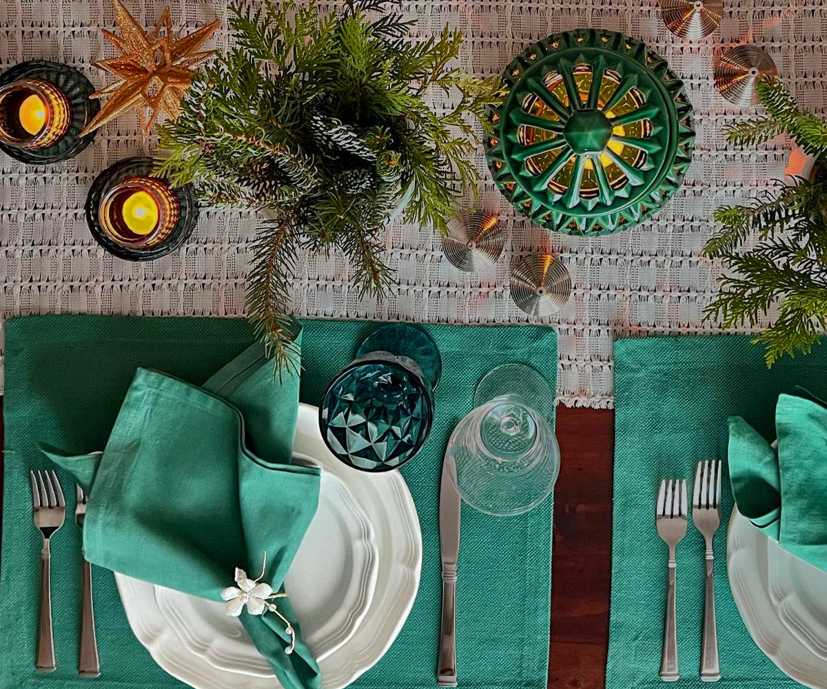 Protect and adorn your dining table with red fabric placemats, adding a touch of elegance to your mealtimes. Protect and adorn your dining table with red fabric placemats, adding a touch of elegance to your mealtimes.