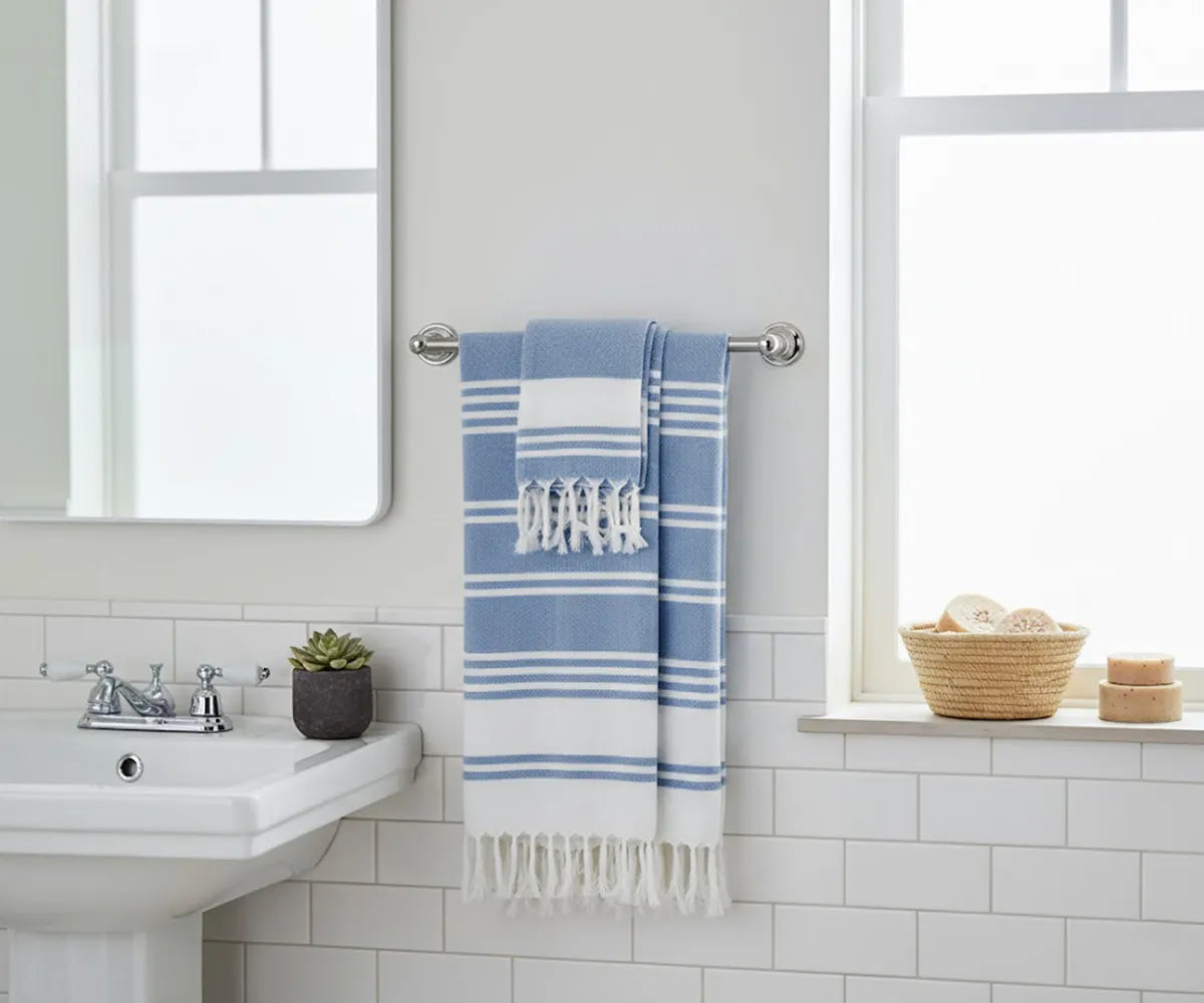 Set of 2 blue Turkish cotton beach towels with white stripes, soft, absorbent, and quick-drying for home or beach use. Set of 2 blue Turkish cotton beach towels with white stripes, soft, absorbent, and quick-drying for home or beach use.