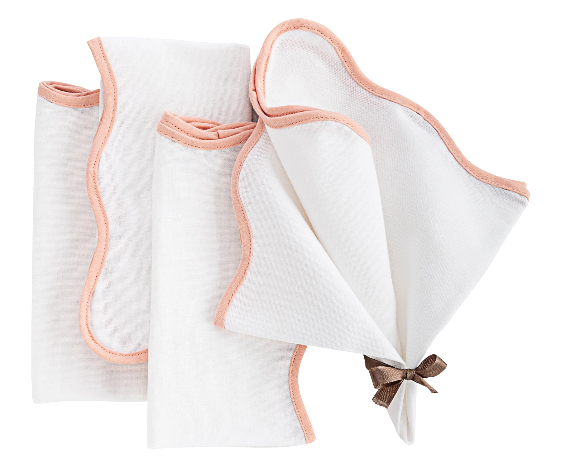 scallop edge napkins with a textured weave, offering style and functionality for dining. scallop edge napkins with a textured weave, offering style and functionality for dining.