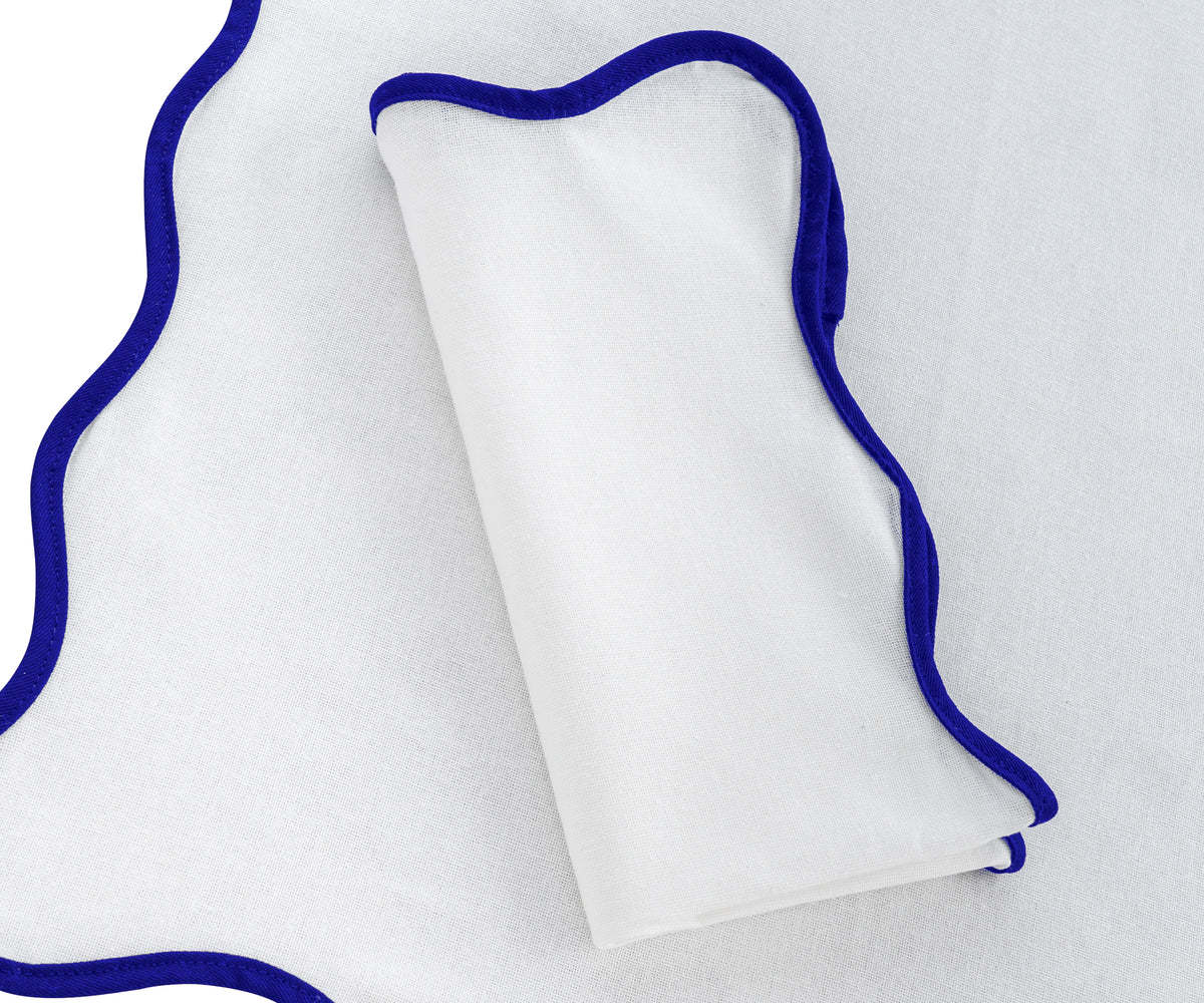 Royal Blue Linen Napkin with White Scalloped Edge – Close-Up Detail Royal Blue Linen Napkin with White Scalloped Edge – Close-Up Detail
