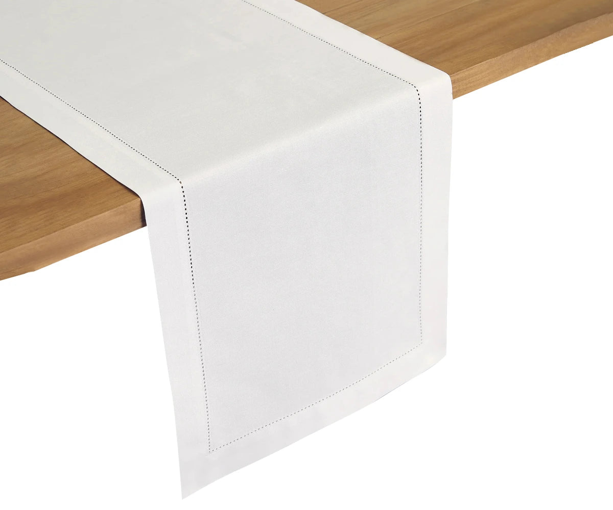 Close-up of classic white linen table runner 14x72 inches – breathable and drapes beautifully for everyday or special dining. Close-up of classic white linen table runner 14x72 inches – breathable and drapes beautifully for everyday or special dining.