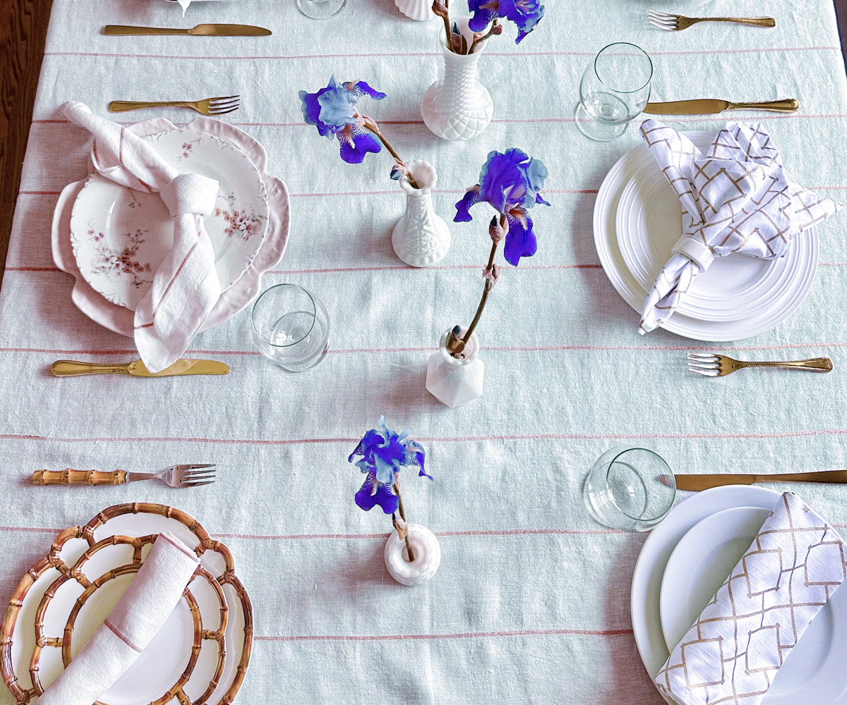 White linen tablecloth, timeless and versatile for any occasion.