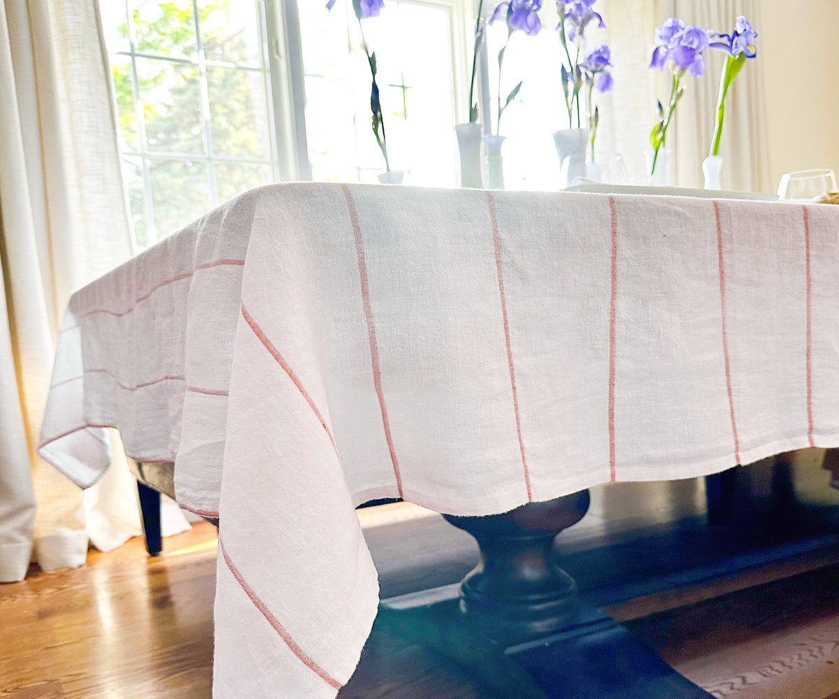100% linen tablecloths, offering durability and style.