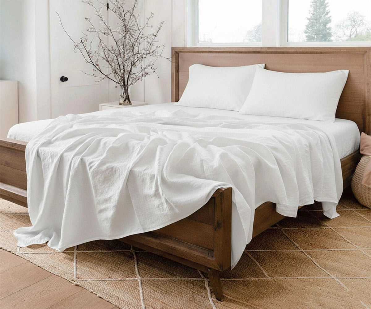 White linen sheet set crafted from 100% pure linen with breathable, durable weave.
Deep pocket king and queen luxury European linen sheets for minimalist bedroom design. White linen sheet set crafted from 100% pure linen with breathable, durable weave.
Deep pocket king and queen luxury European linen sheets for minimalist bedroom design.