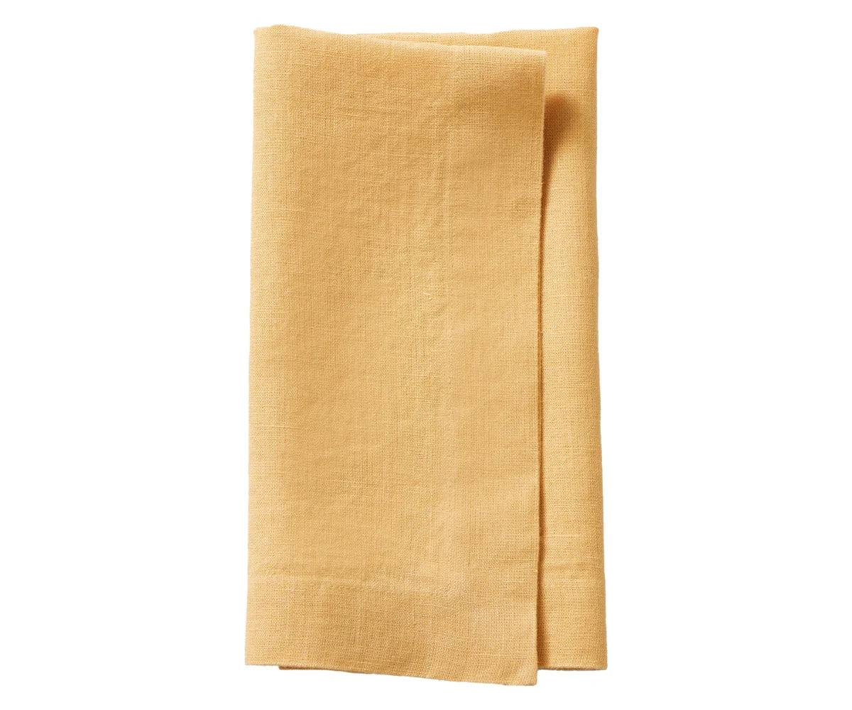 High-quality linen napkins placed on a marble table High-quality linen napkins placed on a marble table