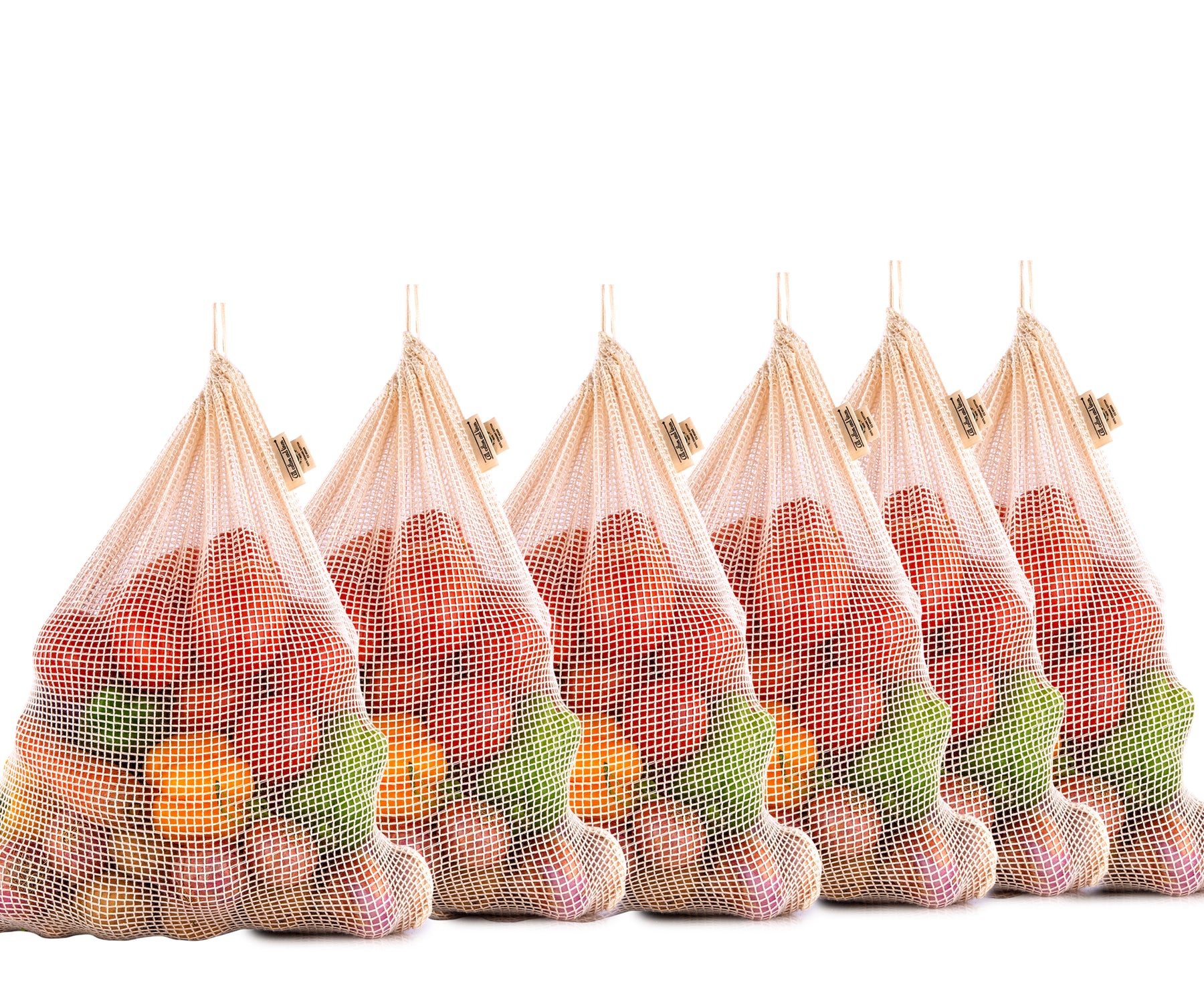 A set of six cotton string bags, each loaded with fruits and vegetables A set of six cotton string bags, each loaded with fruits and vegetables