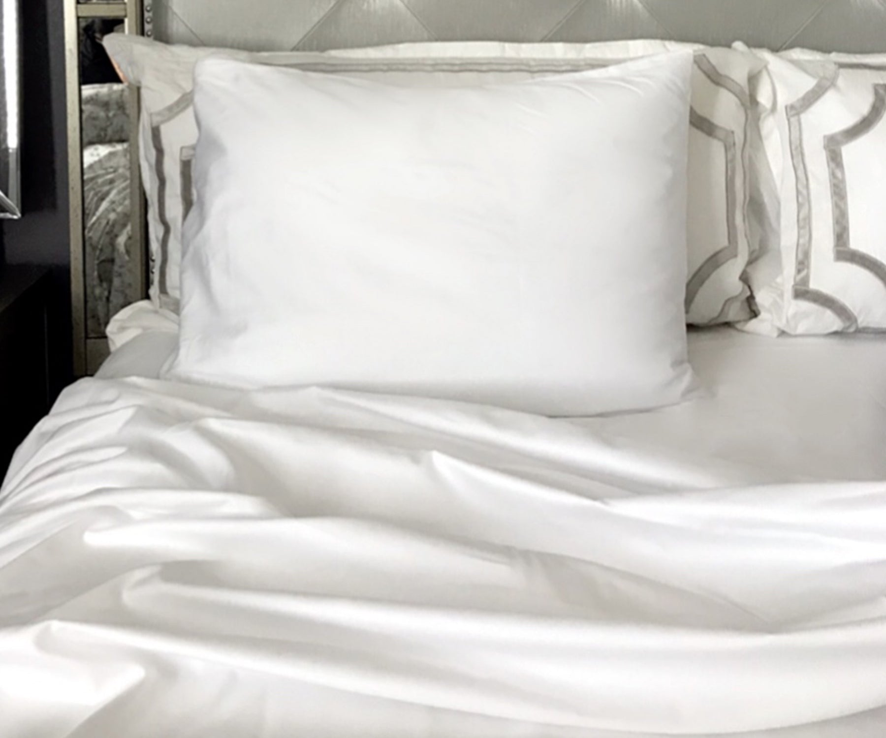Queen-sized fitted sheet, perfectly tailored to fit your mattress for a snug fit.