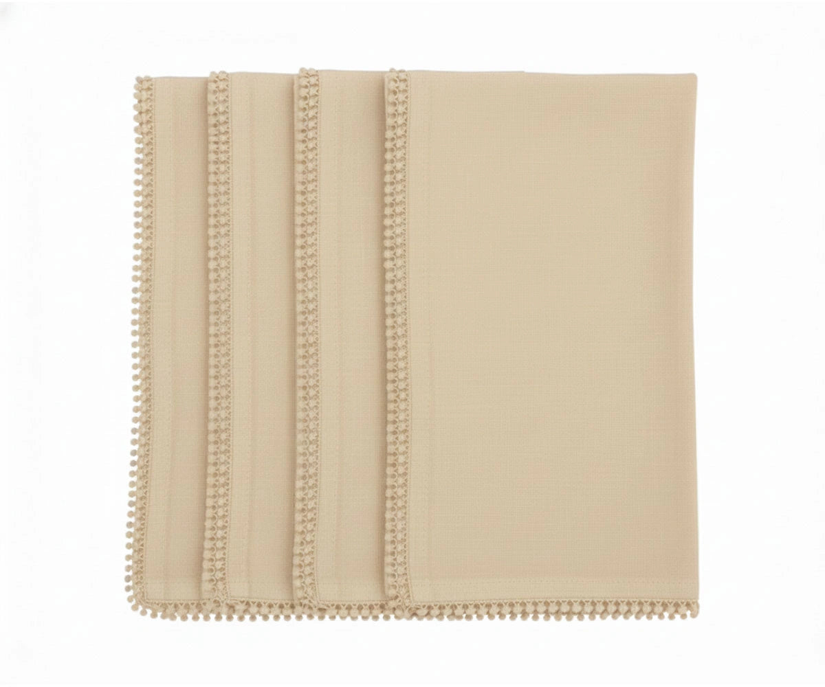 Beige cotton pom pom napkins with knotted edge for neutral farmhouse table décor Beige cotton pom pom napkins with knotted edge for neutral farmhouse table décor