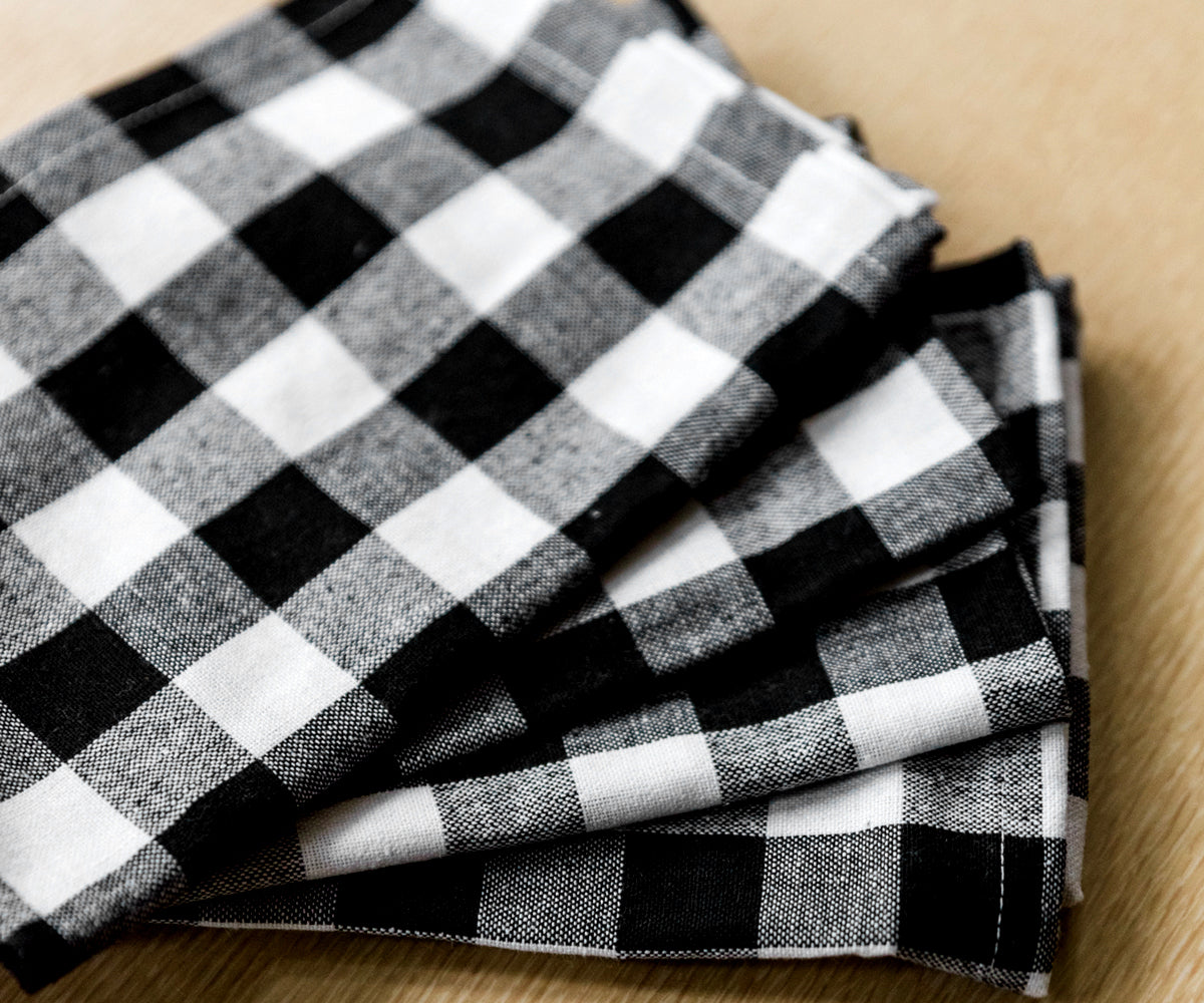 Buffalo plaid napkins, a rustic yet chic addition to your dining decor. Buffalo plaid napkins, a rustic yet chic addition to your dining decor.