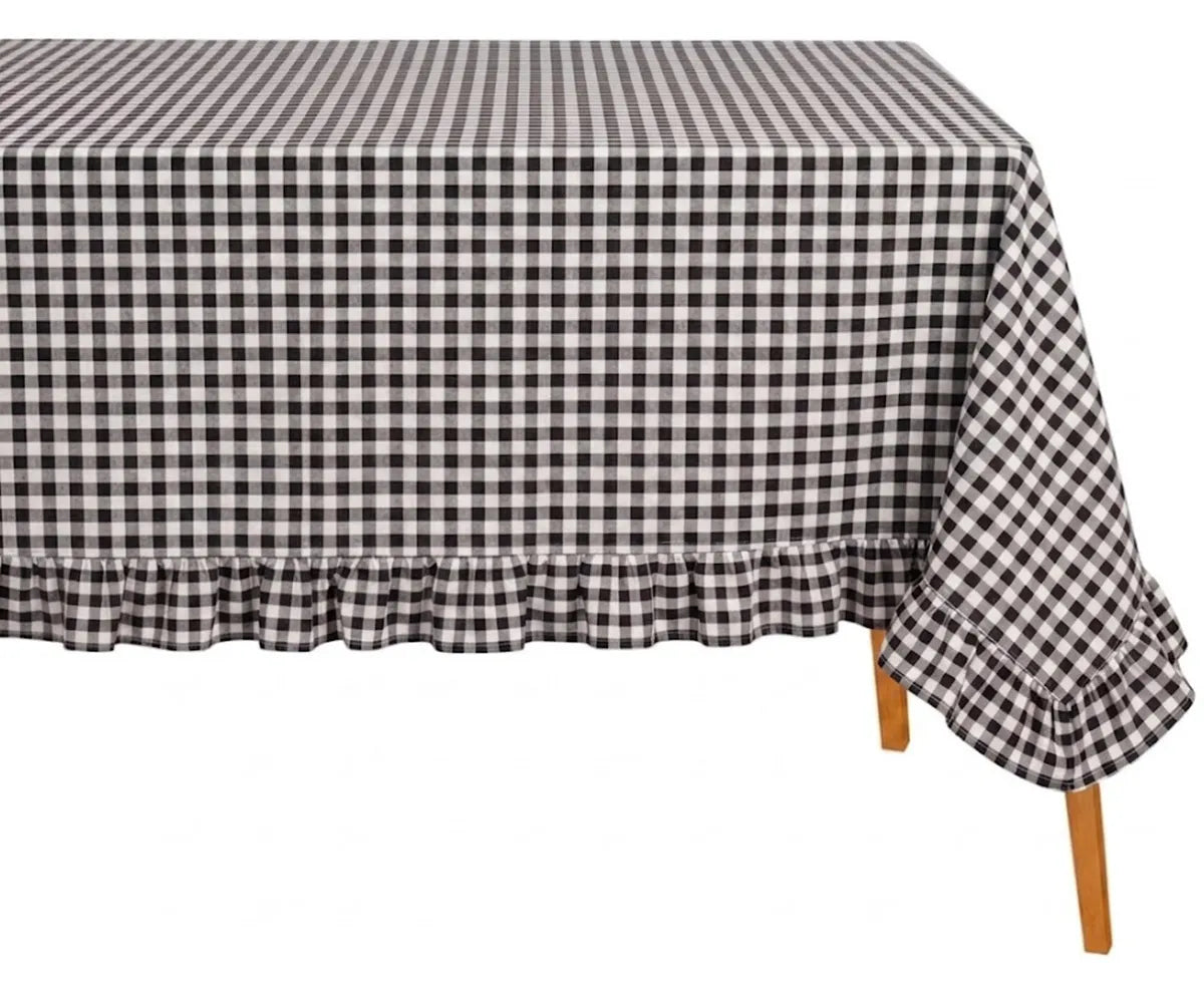 Rectangular cotton gingham tablecloth with soft ruffle edge styled on a dining table for everyday farmhouse decor Rectangular cotton gingham tablecloth with soft ruffle edge styled on a dining table for everyday farmhouse decor