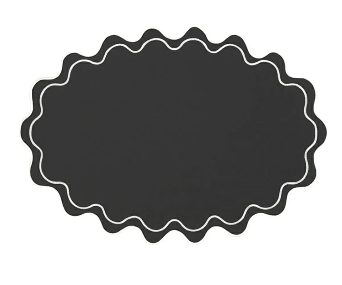 Wavy oval cotton placemat with elegant scalloped edge, designed for refined everyday and event dining tables Wavy oval cotton placemat with elegant scalloped edge, designed for refined everyday and event dining tables