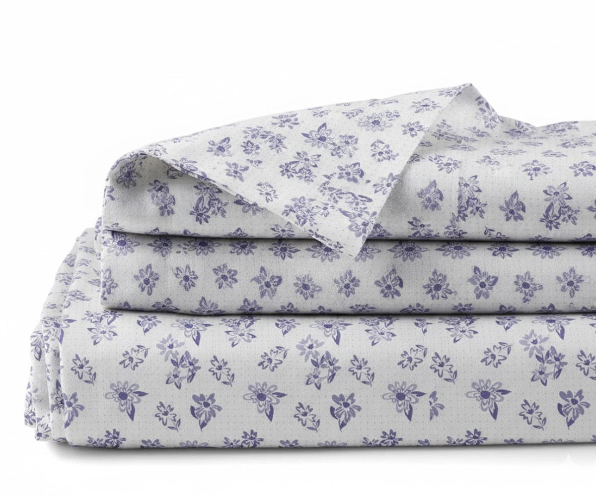 Coastal style bedroom with blue floral printed linen bedding set, breathable percale sheets for all-season comfort Coastal style bedroom with blue floral printed linen bedding set, breathable percale sheets for all-season comfort